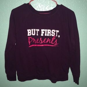 But first, presents pajama shirt or sweater.